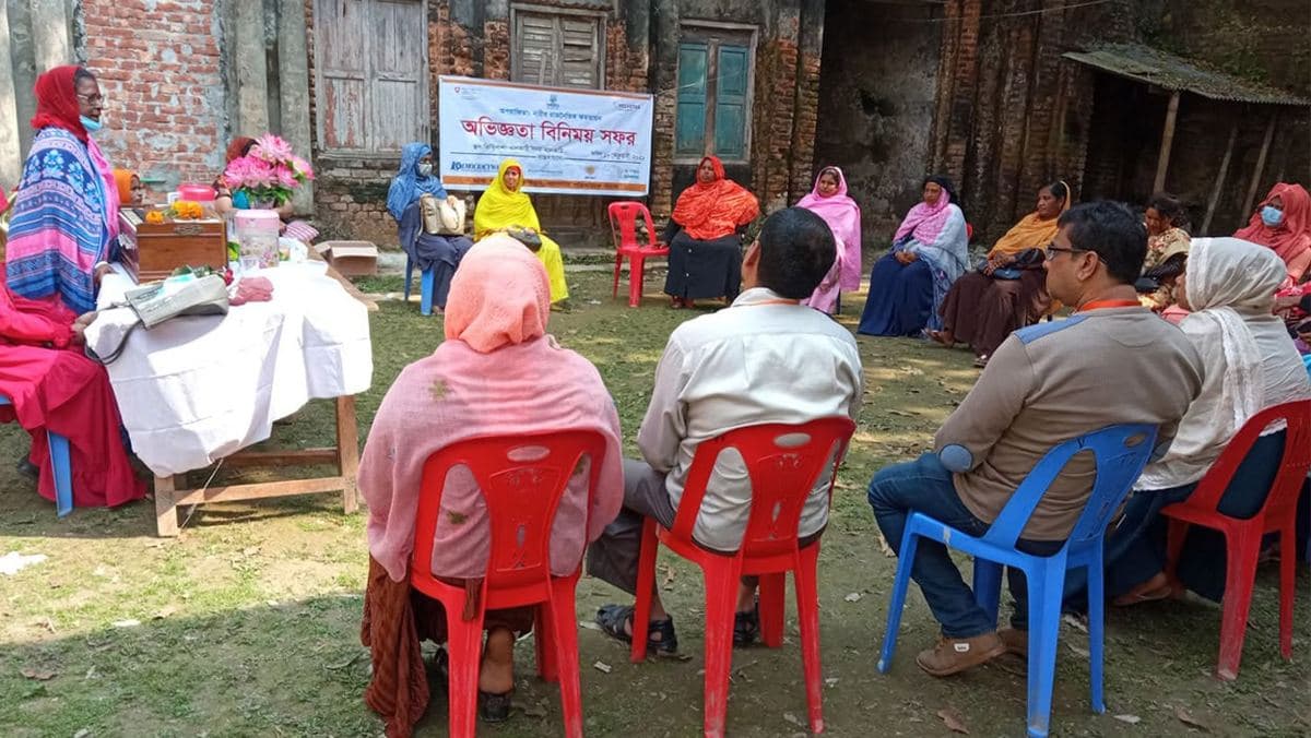 Community meeting in a courtyard